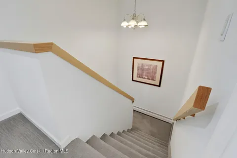 a view of a livingroom with a ceiling fan
