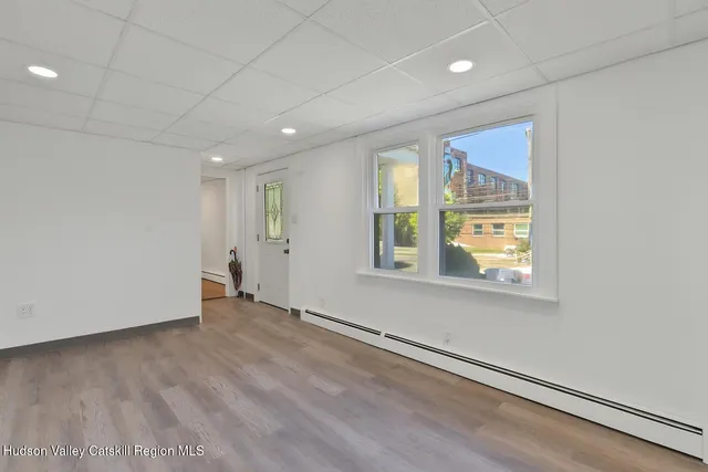 an empty room with windows