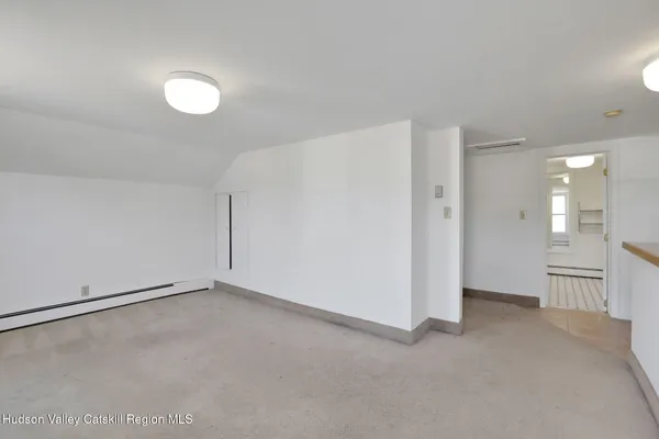 a view of an empty room with window