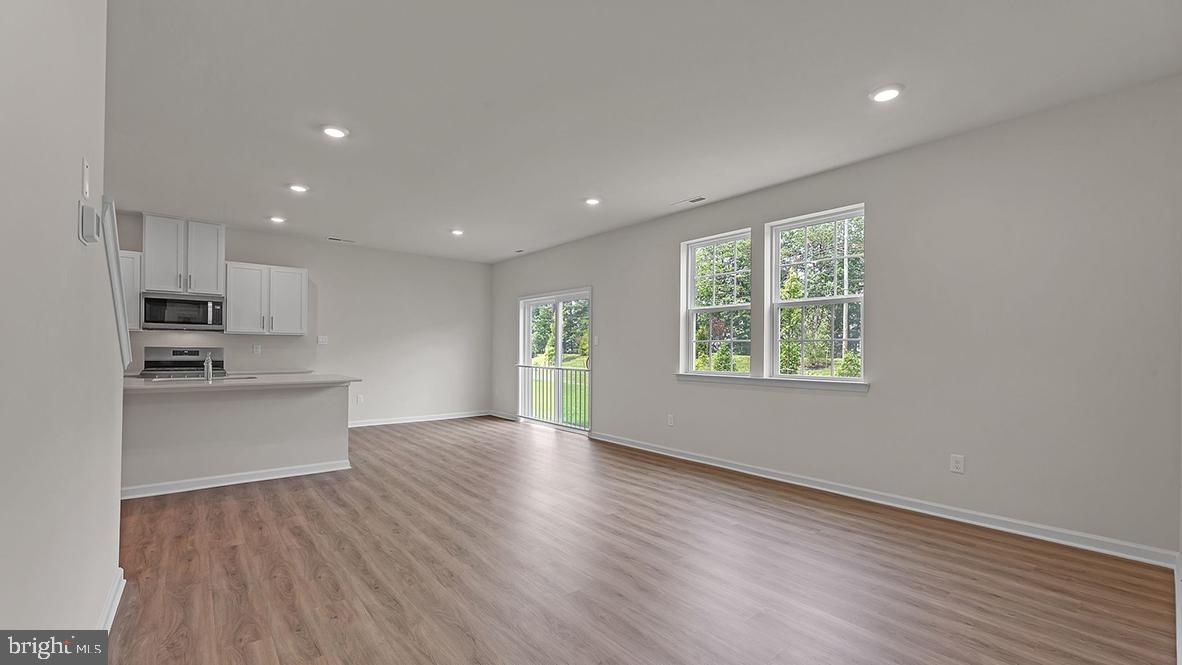 155 Littleworth Road Manahawkin, NJ 08050 - Photo 15 of 32 a view of kitchen with wooden floor and electronic appliances