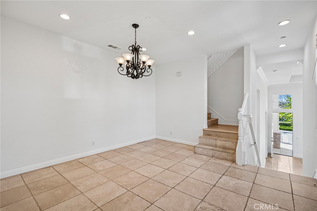 56 Fringe Tree Irvine, CA 92606 - Photo 6 of 26 a view of empty room with wooden floor