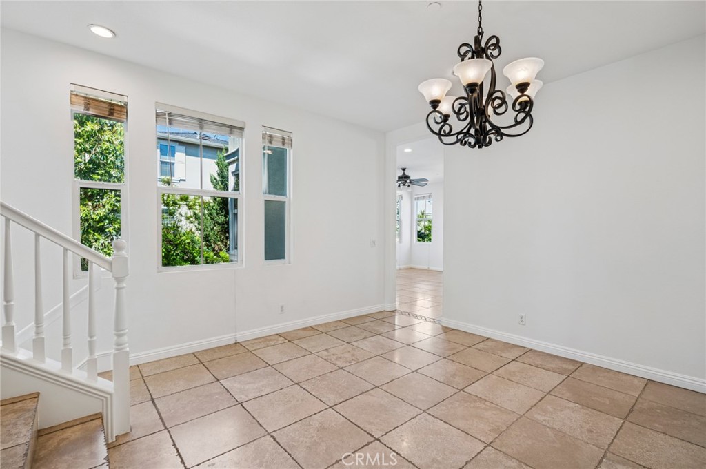56 Fringe Tree Irvine, CA 92606 - Photo 7 of 26 a view of an entryway with wooden floor