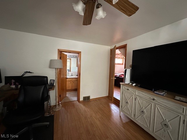 1913 Coltman Road Cleveland, OH 44106 - Photo 6 of 32 Office featuring wood finished floors, a ceiling fan, and baseboards