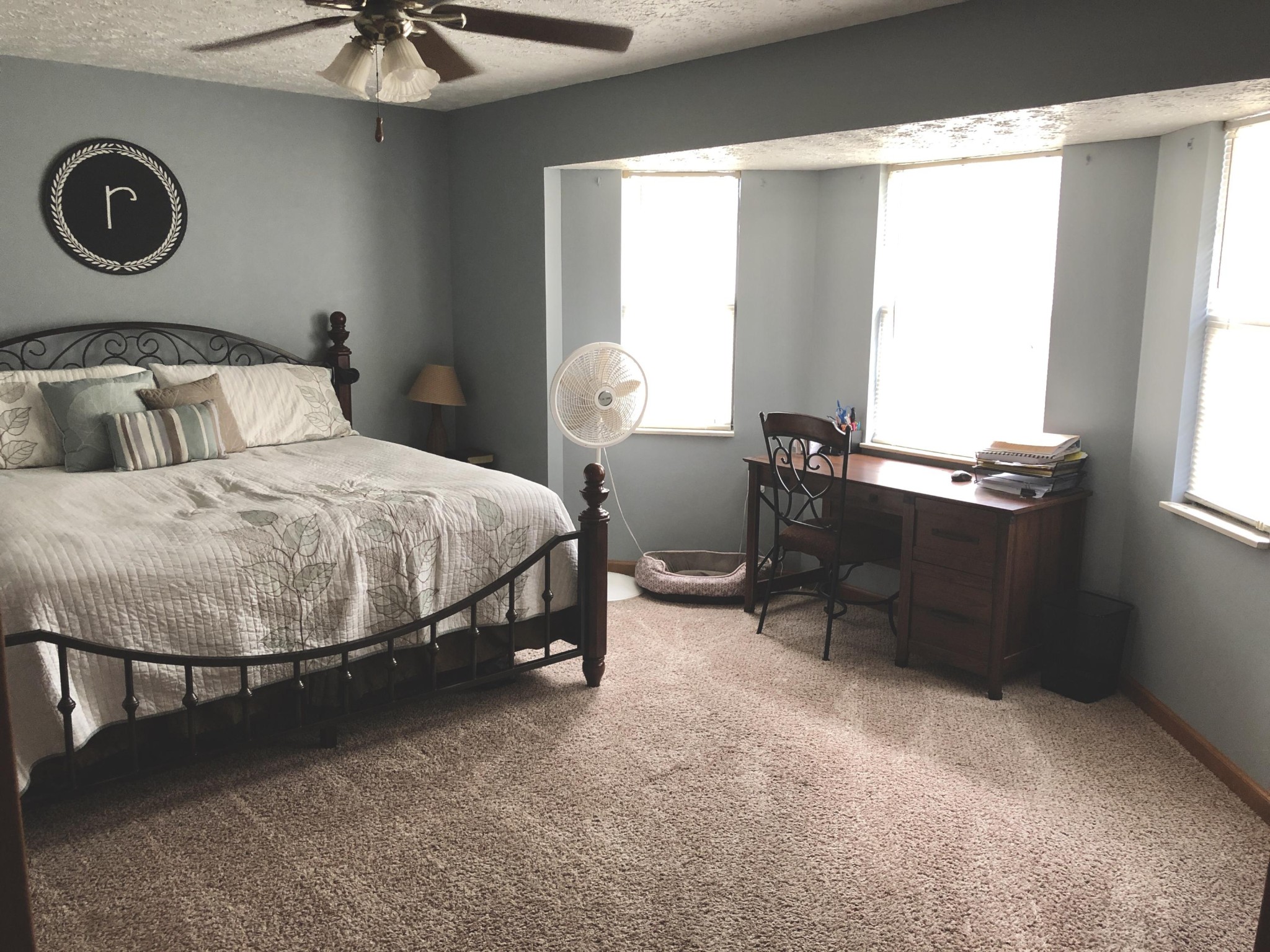 925 Tree Trunk Road Knoxville, TN 37934 - Photo 15 of 32 a bedroom with a bed and a chandelier