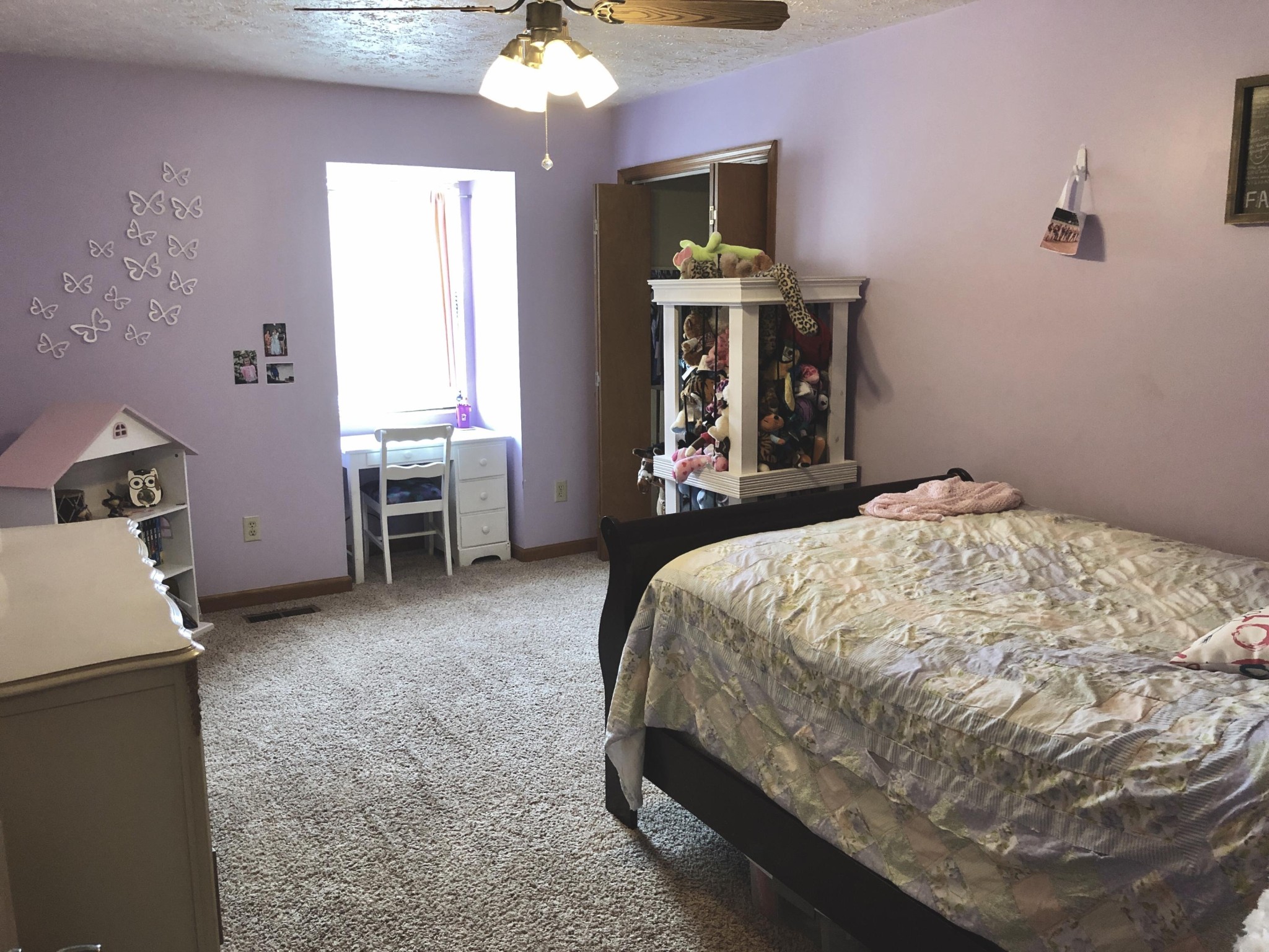 925 Tree Trunk Road Knoxville, TN 37934 - Photo 21 of 32 a bed sitting in a room next to a window
