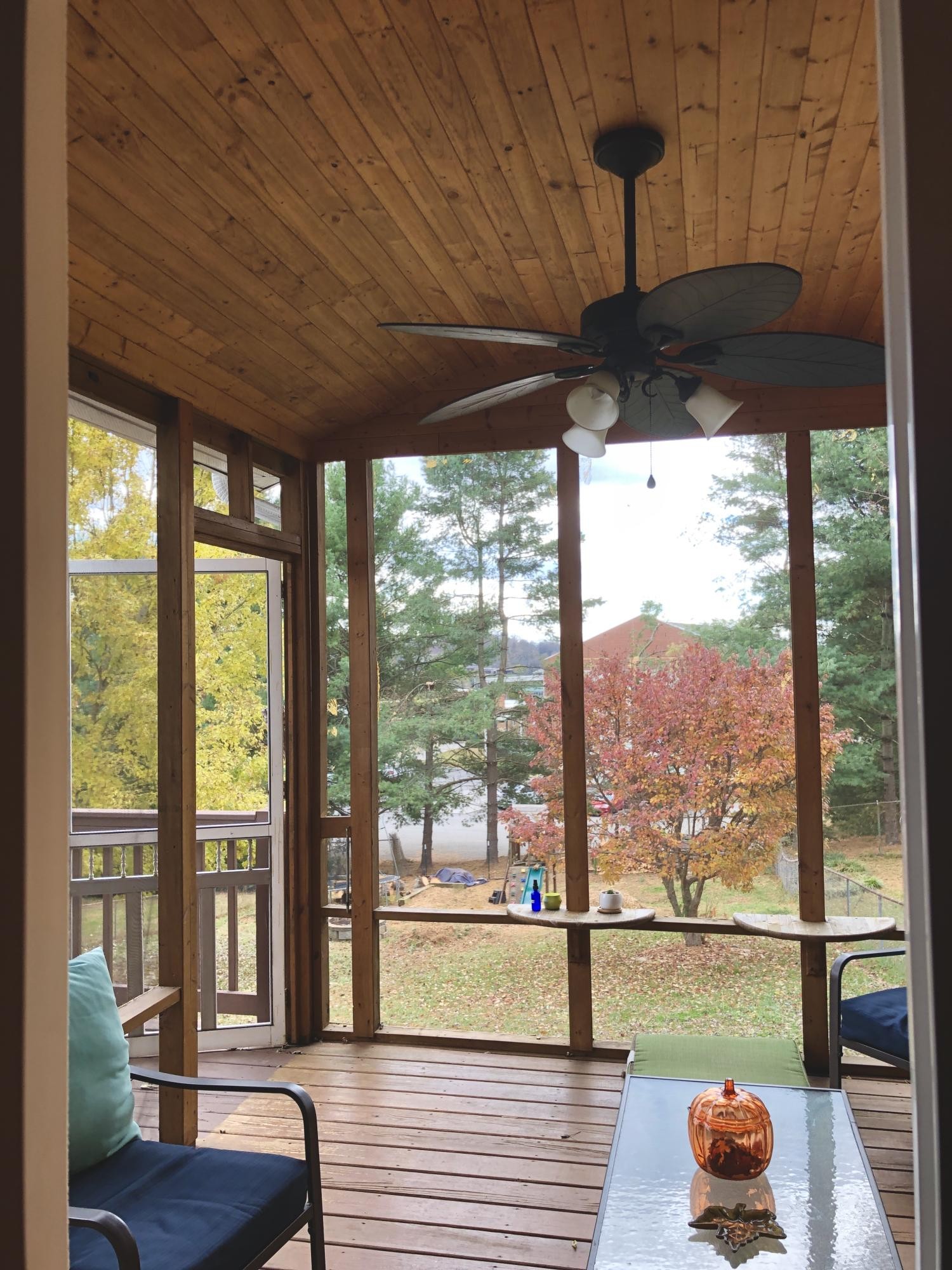 925 Tree Trunk Road Knoxville, TN 37934 - Photo 25 of 32 a view of a living room and floor to ceiling window with an umbrella