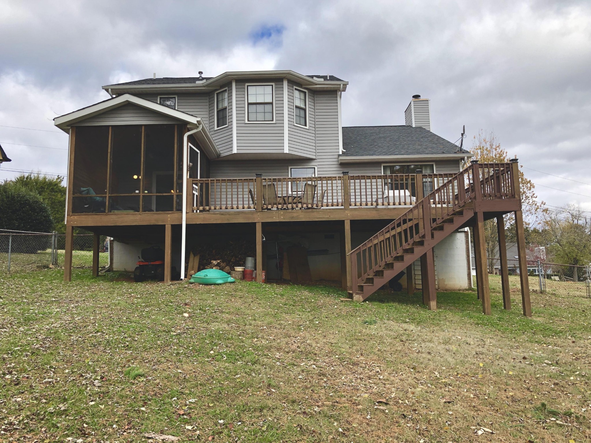 925 Tree Trunk Road Knoxville, TN 37934 - Photo 28 of 32 a front view of a house with a yard and deck