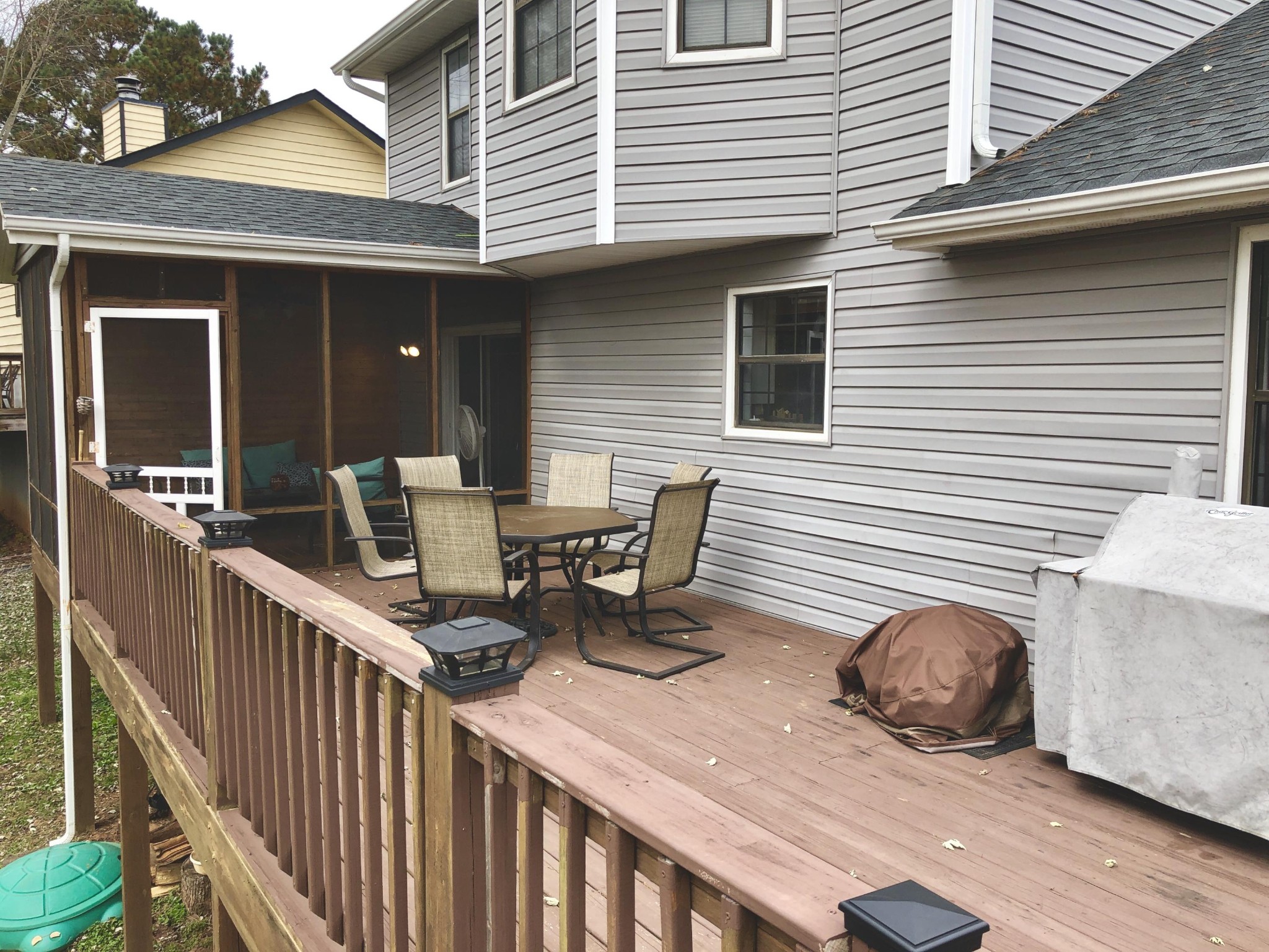 925 Tree Trunk Road Knoxville, TN 37934 - Photo 31 of 32 a view of a deck with two chairs and a wooden floor