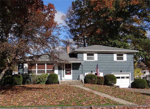 front view of a house with a patio