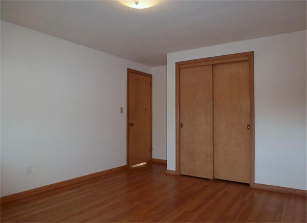 133 West Meadowview Road Holyoke, MA 01040 - Photo 12 of 29 a view of an empty room with wooden floor and closet