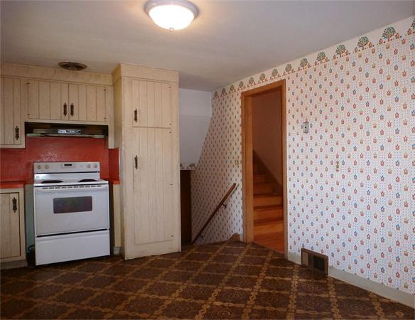 133 West Meadowview Road Holyoke, MA 01040 - Photo 9 of 29 a kitchen with a cabinets and white appliances