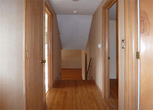 133 West Meadowview Road Holyoke, MA 01040 - Photo 10 of 29 a view of a hallway with wooden floor and staircase