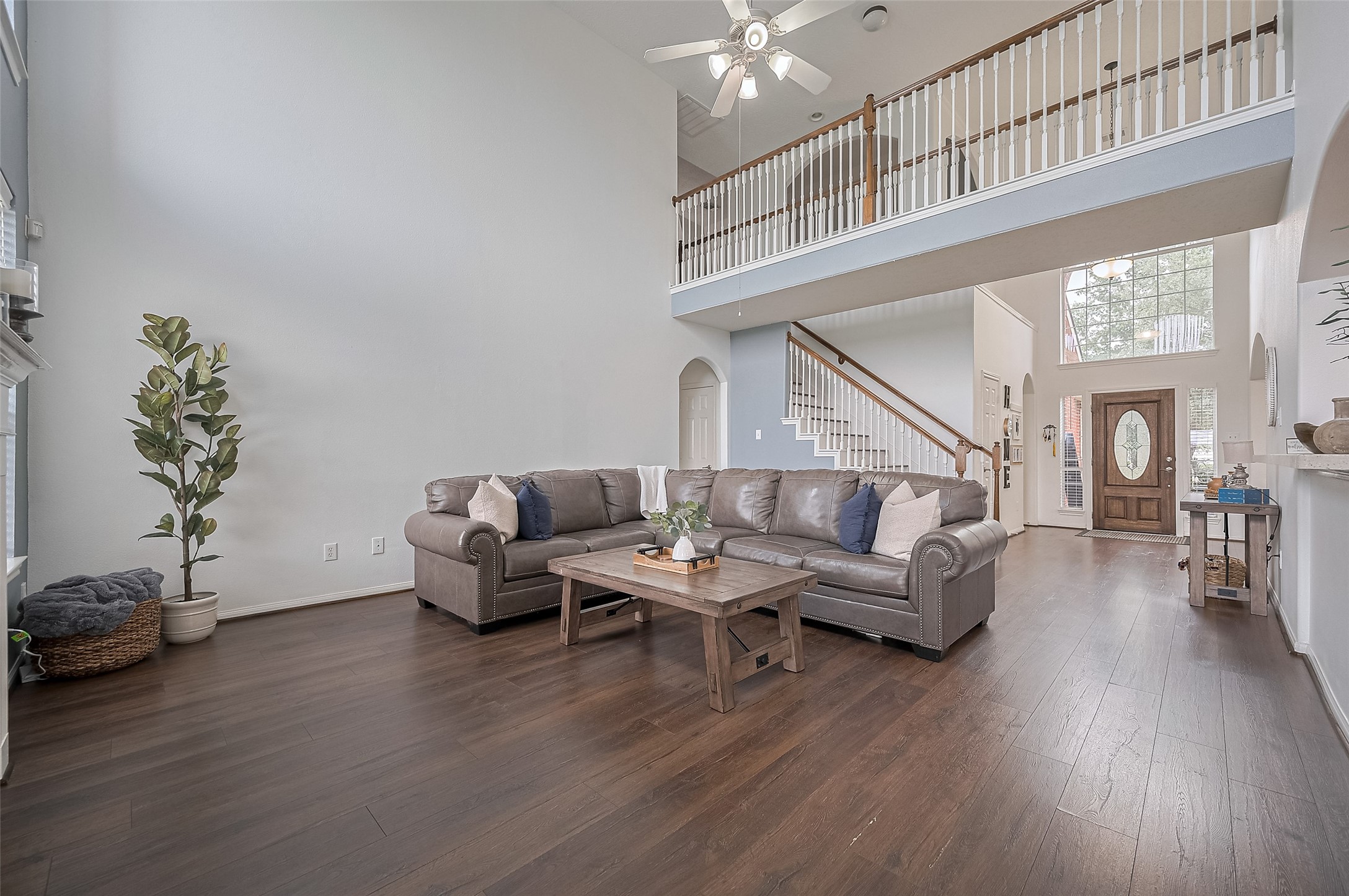 21506 Avalon Queen Drive Spring, TX 77379 - Photo 2 of 48 a living room with furniture and wooden floor