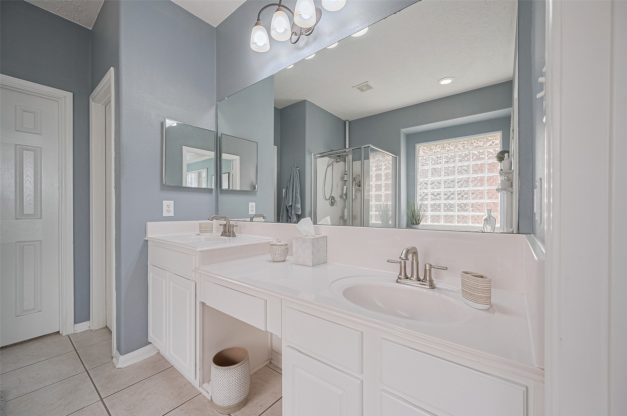 21506 Avalon Queen Drive Spring, TX 77379 - Photo 25 of 48 a bathroom with a sink double vanity and a mirror