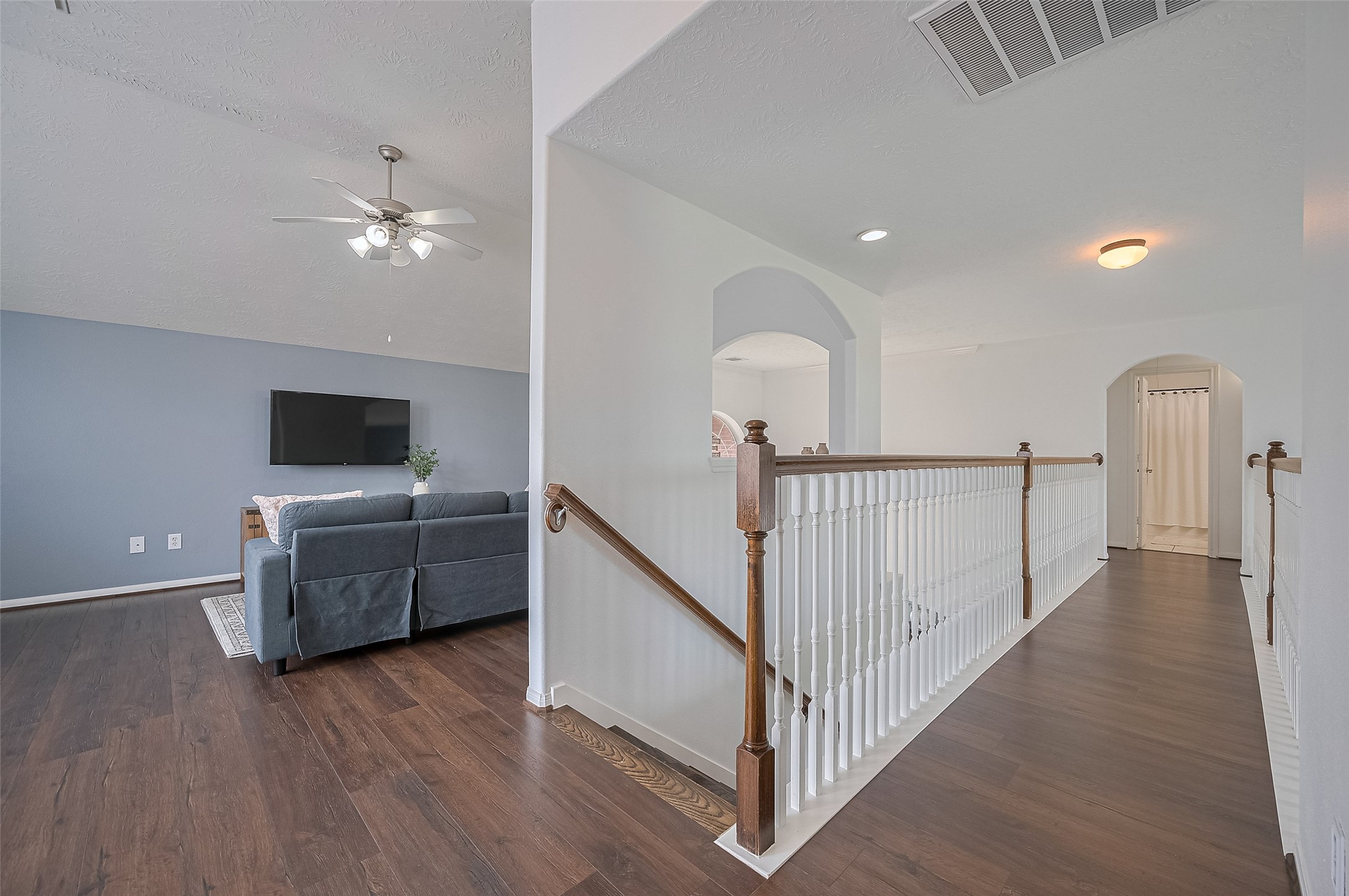 21506 Avalon Queen Drive Spring, TX 77379 - Photo 30 of 48 a view of a livingroom with wooden floor and furniture