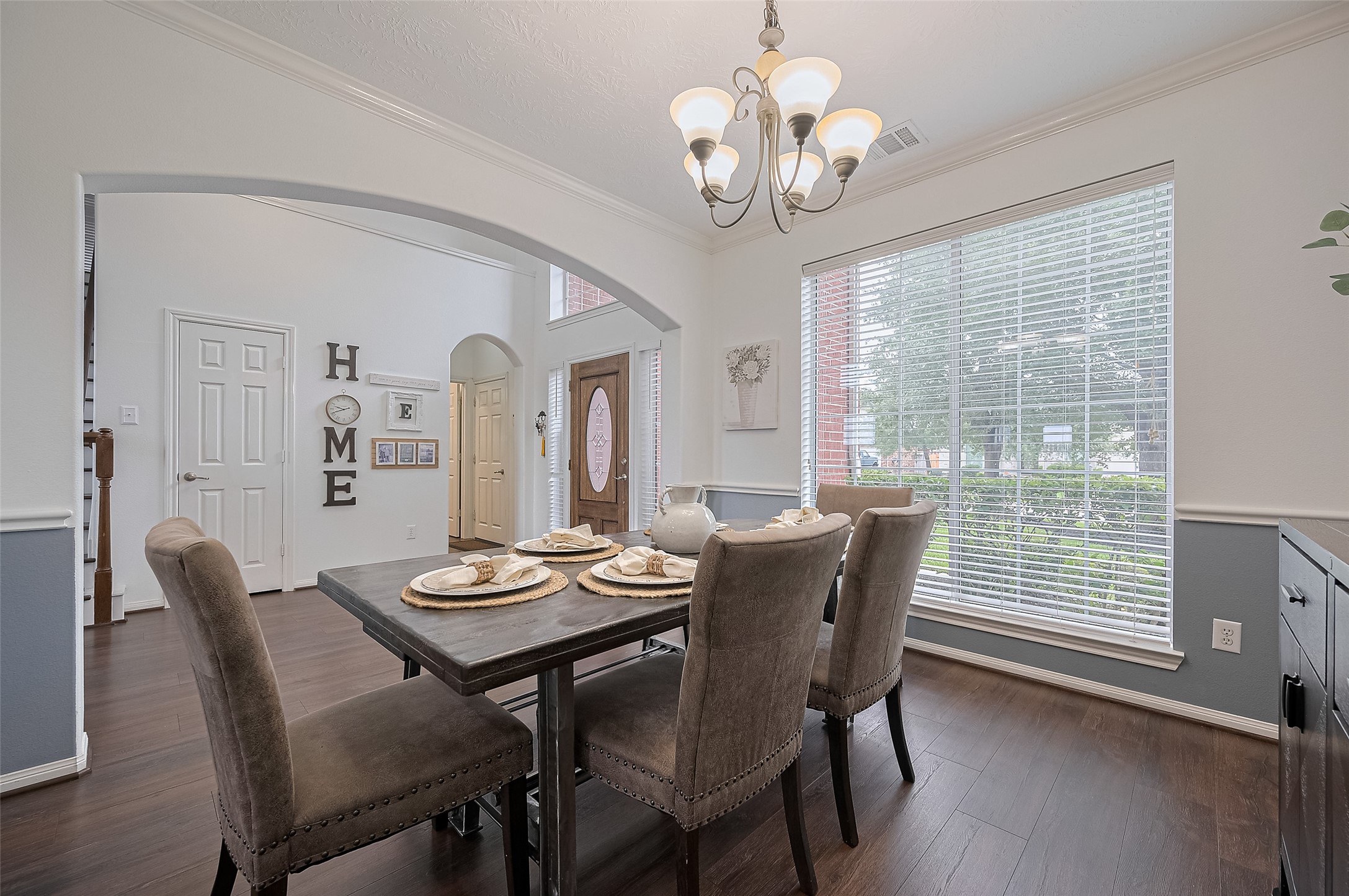 21506 Avalon Queen Drive Spring, TX 77379 - Photo 3 of 48 a view of a dining room with furniture window and wooden floor