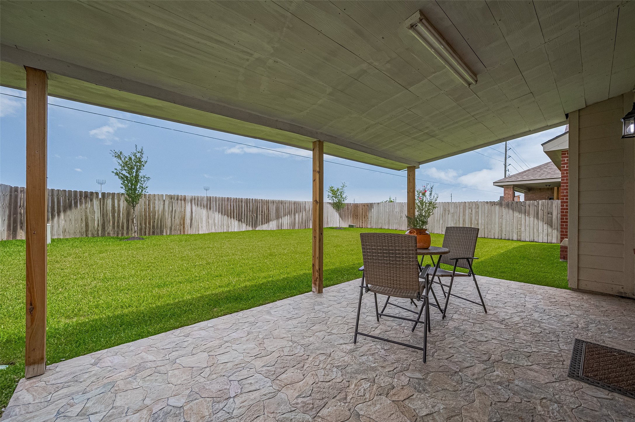 21506 Avalon Queen Drive Spring, TX 77379 - Photo 44 of 48 a view of a patio with table and chairs and potted plants