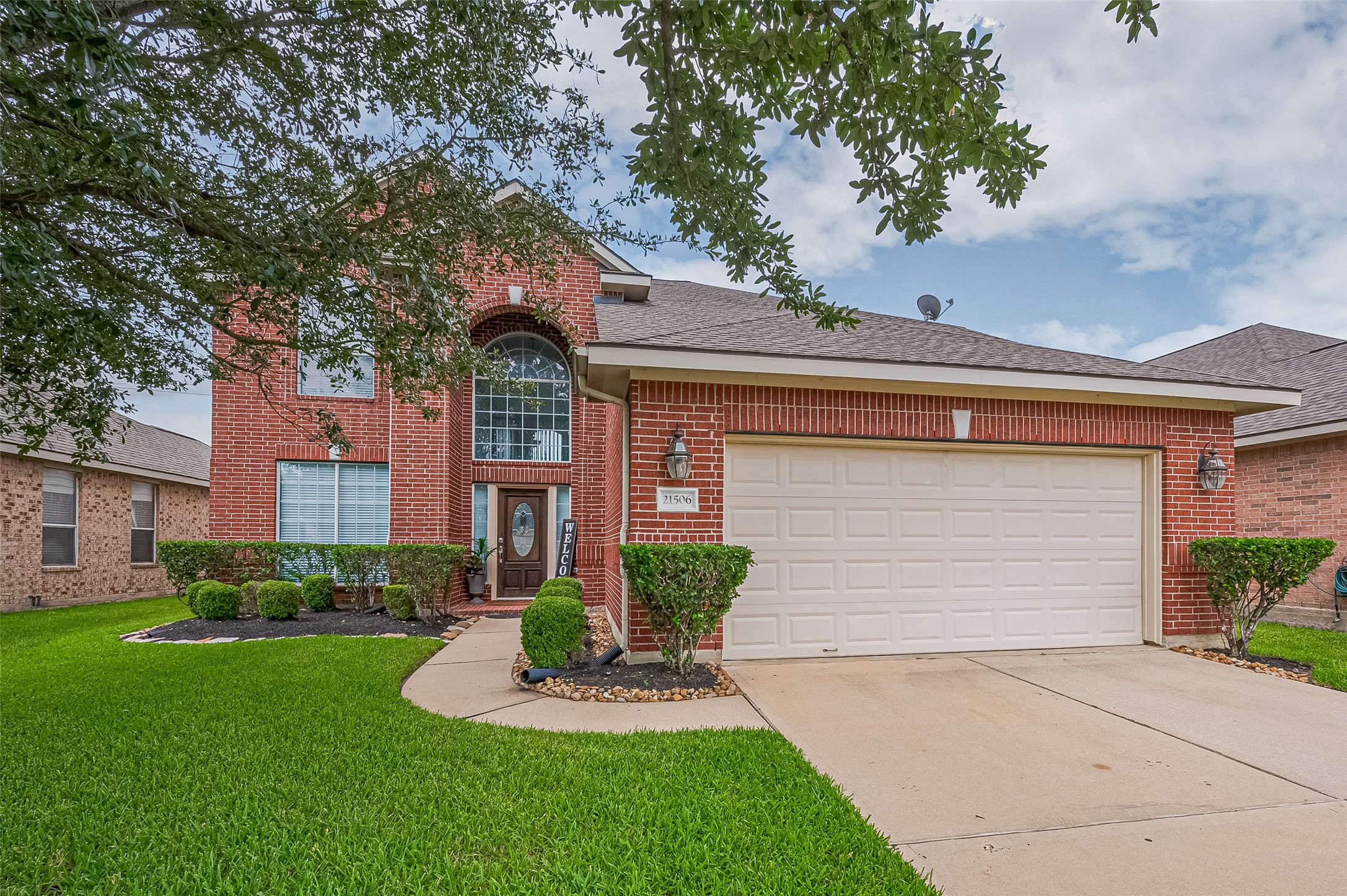 21506 Avalon Queen Drive Spring, TX 77379 - Photo 48 of 48 Welcome to classic charm and exceptional curb appeal! The grand arched window above the entry door floods the foyer with natural light, creating a striking first impression.