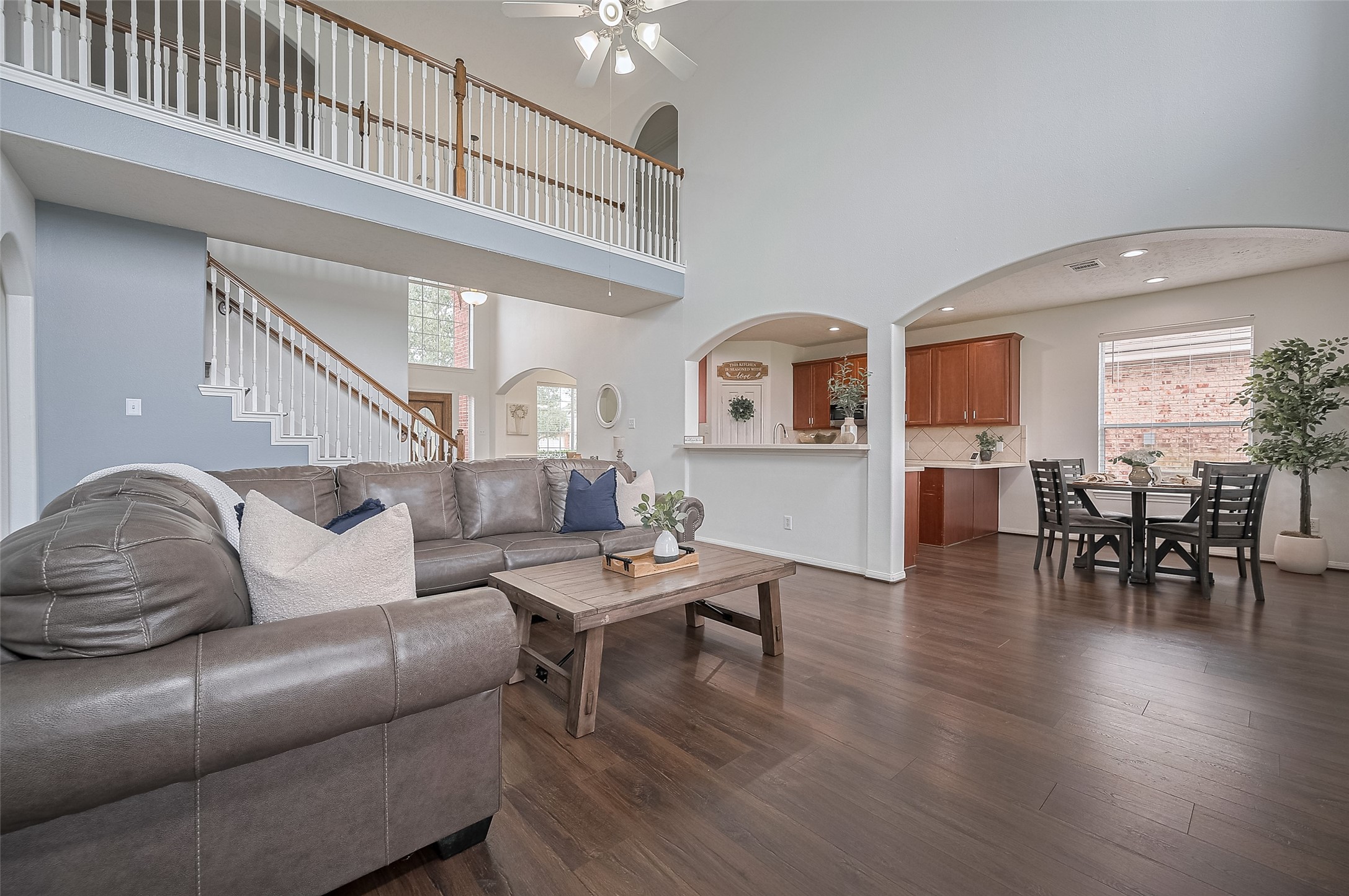 21506 Avalon Queen Drive Spring, TX 77379 - Photo 7 of 48 a living room with furniture and wooden floor