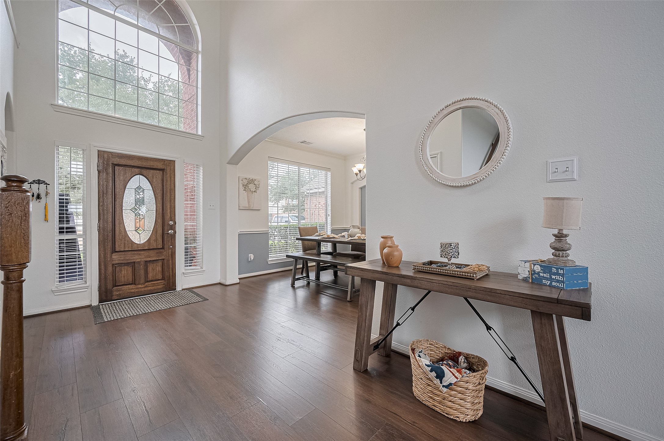 21506 Avalon Queen Drive Spring, TX 77379 - Photo 9 of 48 A warm and inviting entryway with beautiful architectural details and natural light.