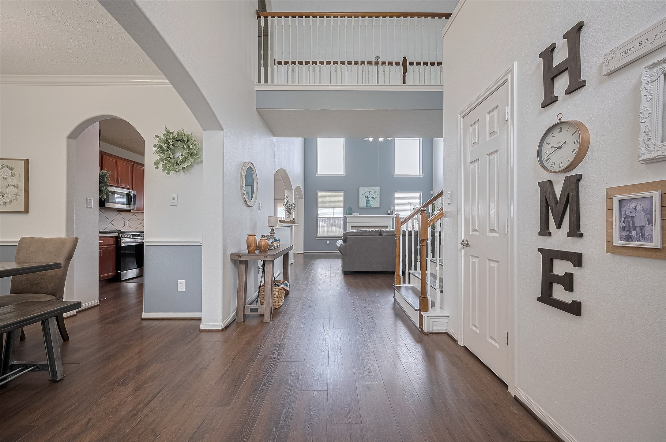 21506 Avalon Queen Drive Spring, TX 77379 - Photo 10 of 48 Stunning hardwood-style flooring flows throughout the main level