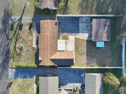 an aerial view of a house with a garden