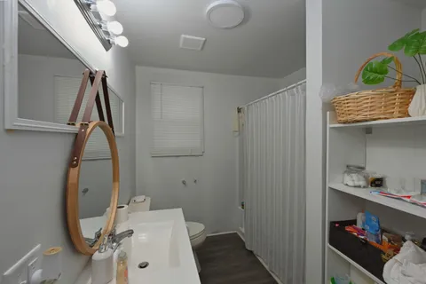 a kitchen with stainless steel appliances a refrigerator and a microwave