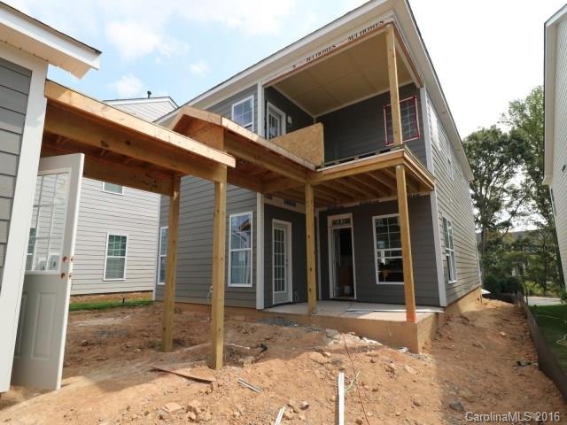 5165 Waterloo Drive, Unit CC153 Tega Cay, SC 29708 - Photo 2 of 6 a view of a house with a outdoor space