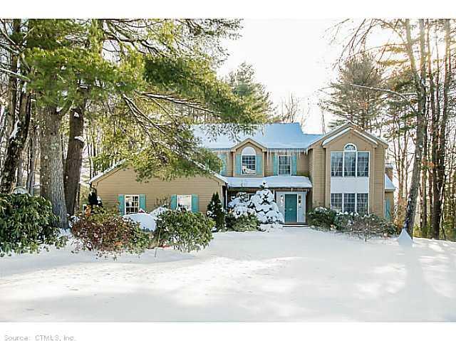 26 Thompson Hill Road Canton, CT 06019 - Photo 1 of 1 a front view of a house with a yard and garage