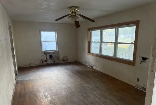 a view of an empty room with a window