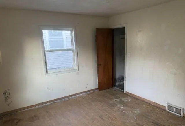 an empty room with windows