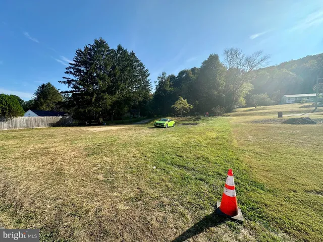a view of a pool with an outdoor space