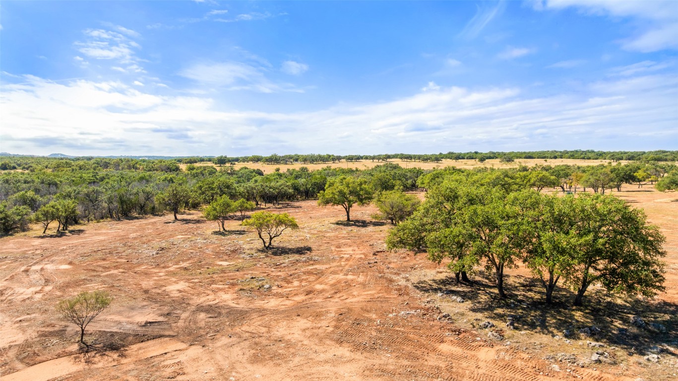 2560 Towhead Valley Road Johnson City, TX 78636 - Photo 4 of 10 a view of a lake with a beach