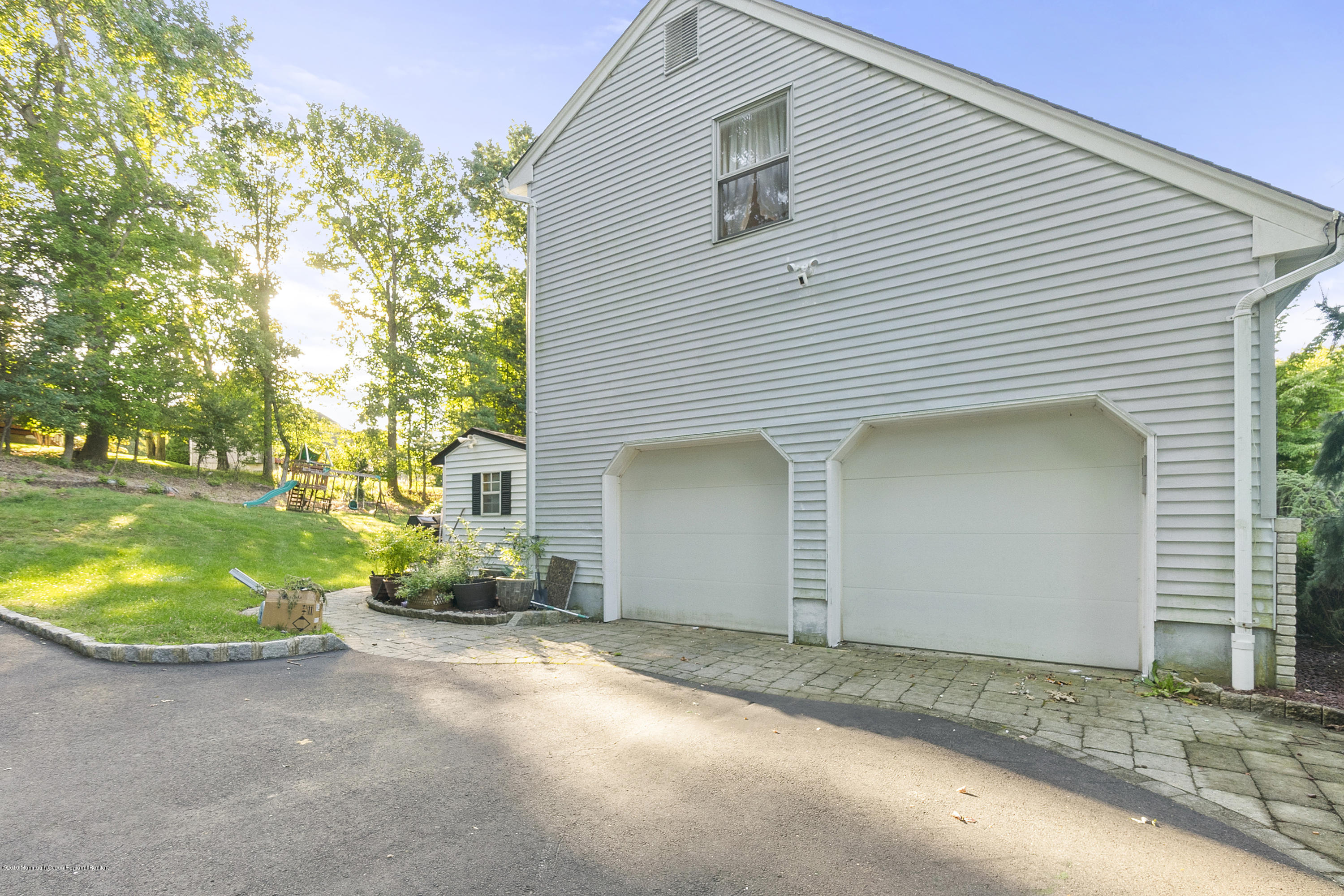 235 Nottingham Road Morganville, NJ 07751 - Photo 13 of 42 Outside - Garage