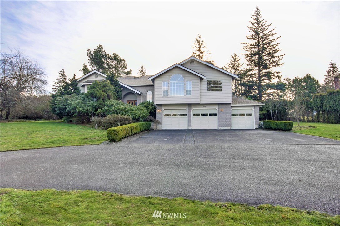 242 Middlefield Road Bellingham, WA 98225 - Photo 1 of 31 a view of backyard with a garden and entertaining space