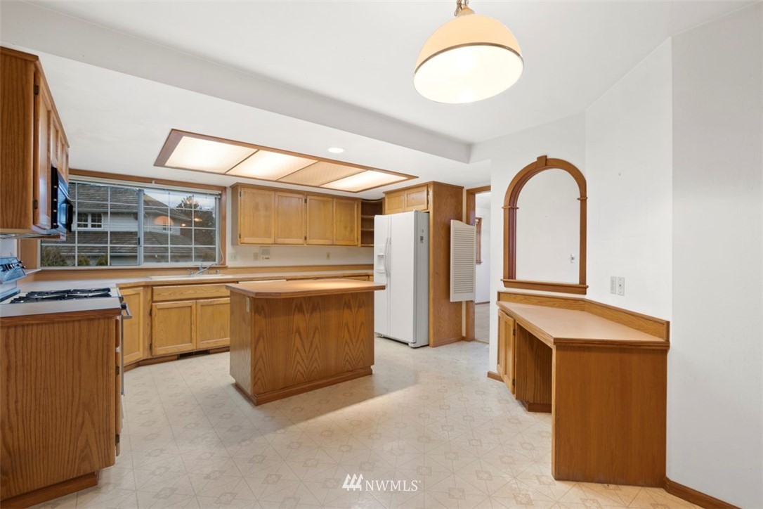 242 Middlefield Road Bellingham, WA 98225 - Photo 13 of 31 a kitchen with sink and cabinets