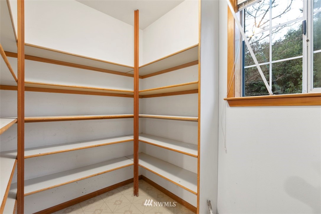 242 Middlefield Road Bellingham, WA 98225 - Photo 17 of 31 a view of bedroom with a large window