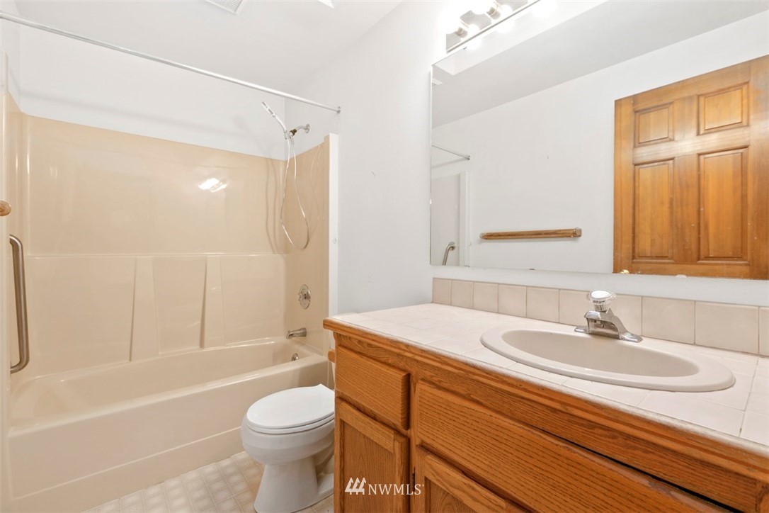 242 Middlefield Road Bellingham, WA 98225 - Photo 20 of 31 a bathroom with a sink a toilet and shower