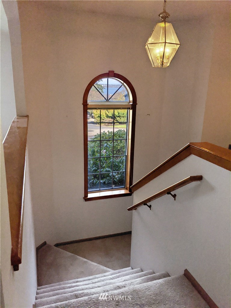 242 Middlefield Road Bellingham, WA 98225 - Photo 3 of 31 a view of a livingroom with a window and a chandelier