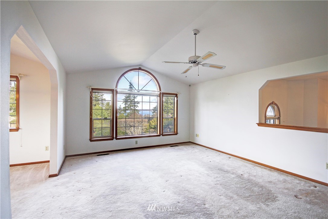242 Middlefield Road Bellingham, WA 98225 - Photo 4 of 31 a view of an empty room with a window