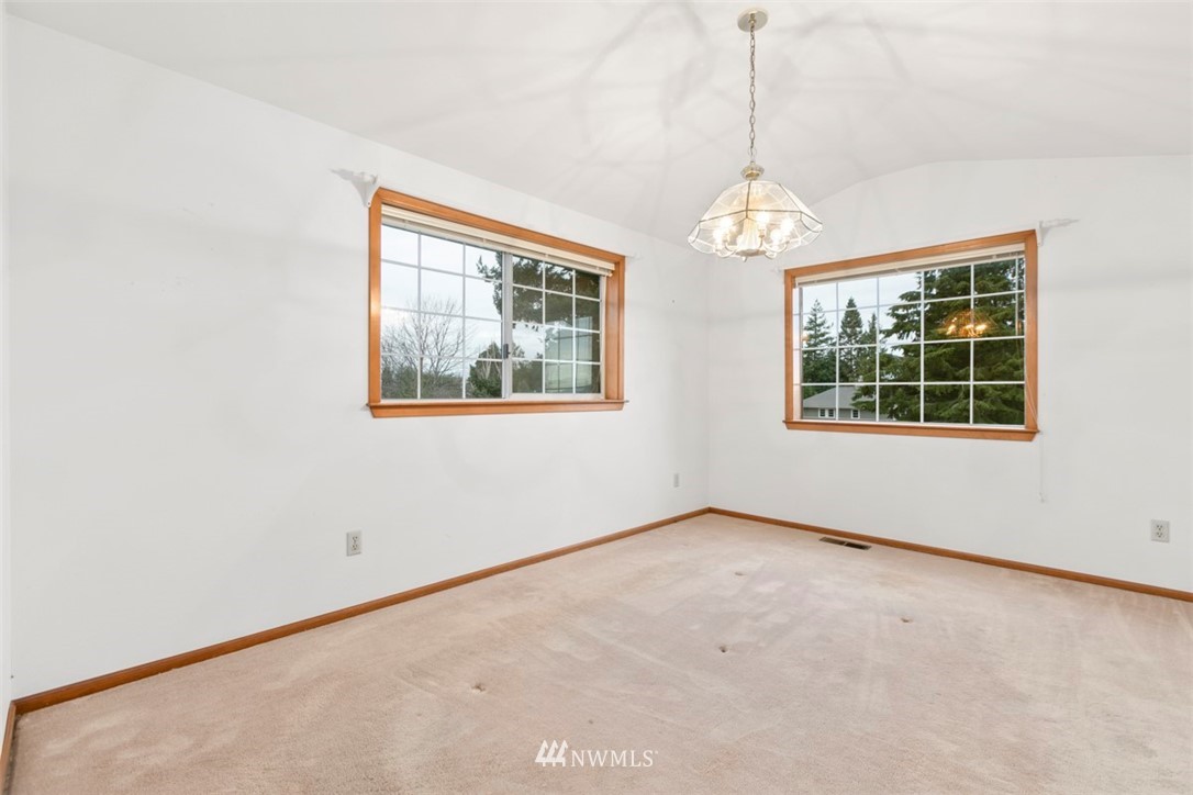 242 Middlefield Road Bellingham, WA 98225 - Photo 10 of 31 an empty room with windows