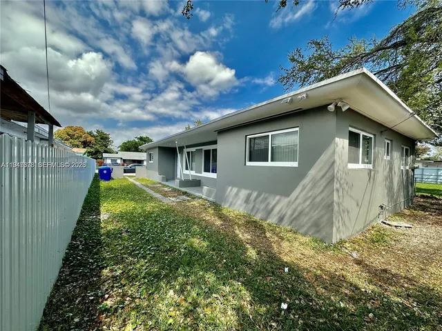a view of backyard of house