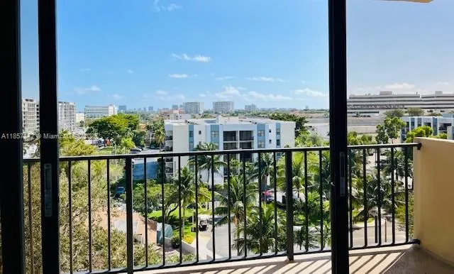 a view of a balcony with city view