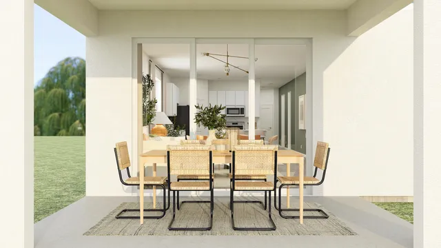 a dining room with furniture and window