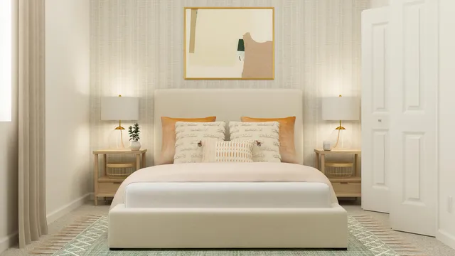 a bedroom with a bed and a painting on the wall