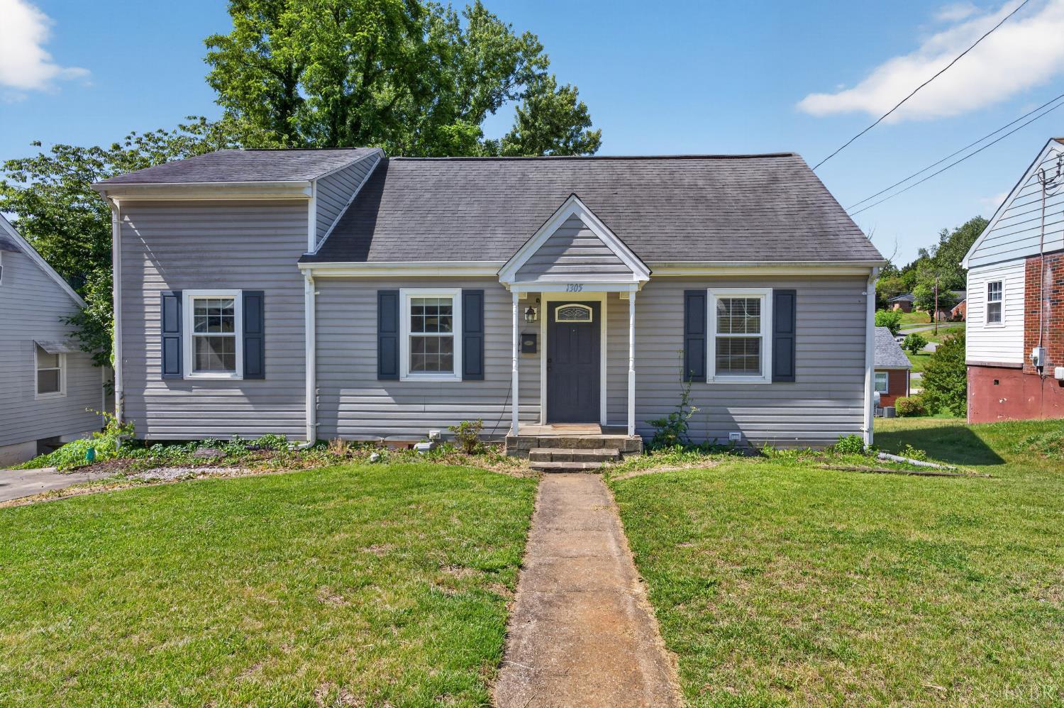 1305 Harding Street Lynchburg, VA 24502 - Photo 1 of 33 a front view of a house with a yard