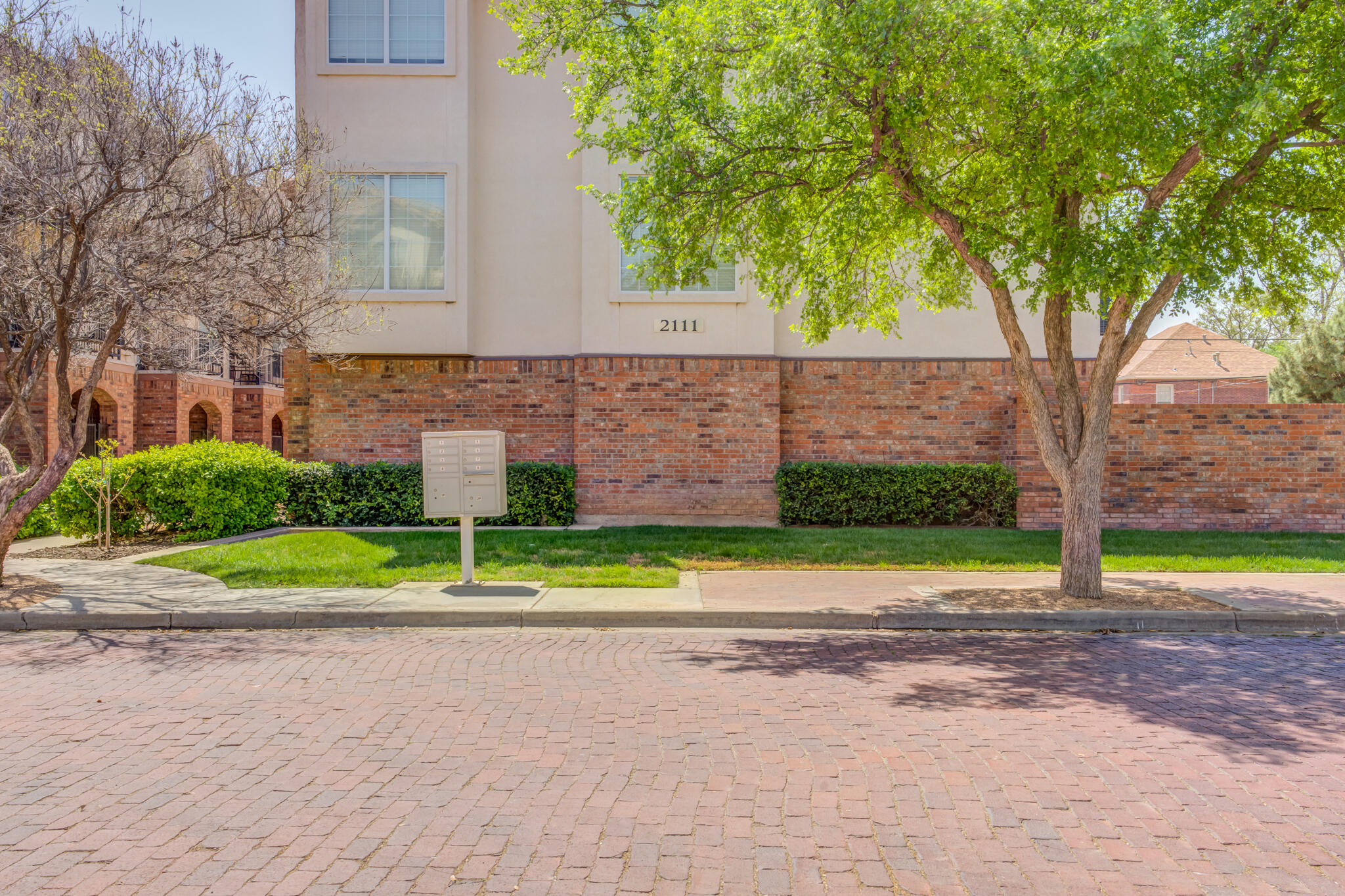 a view of street with tall buildings