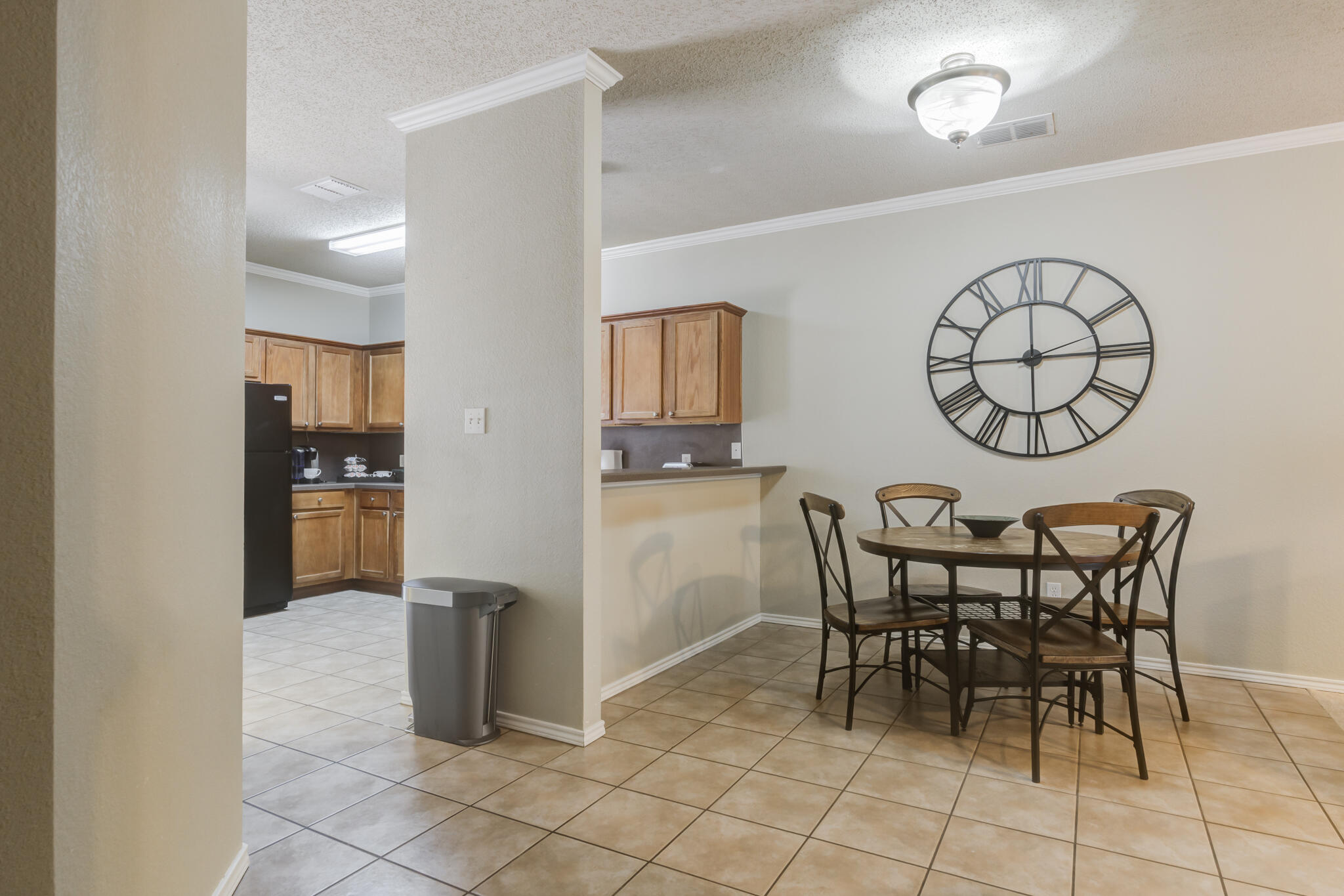2111 Main Street, Unit 3 Lubbock, TX 79401 - Photo 12 of 49 a view of a dining room with furniture