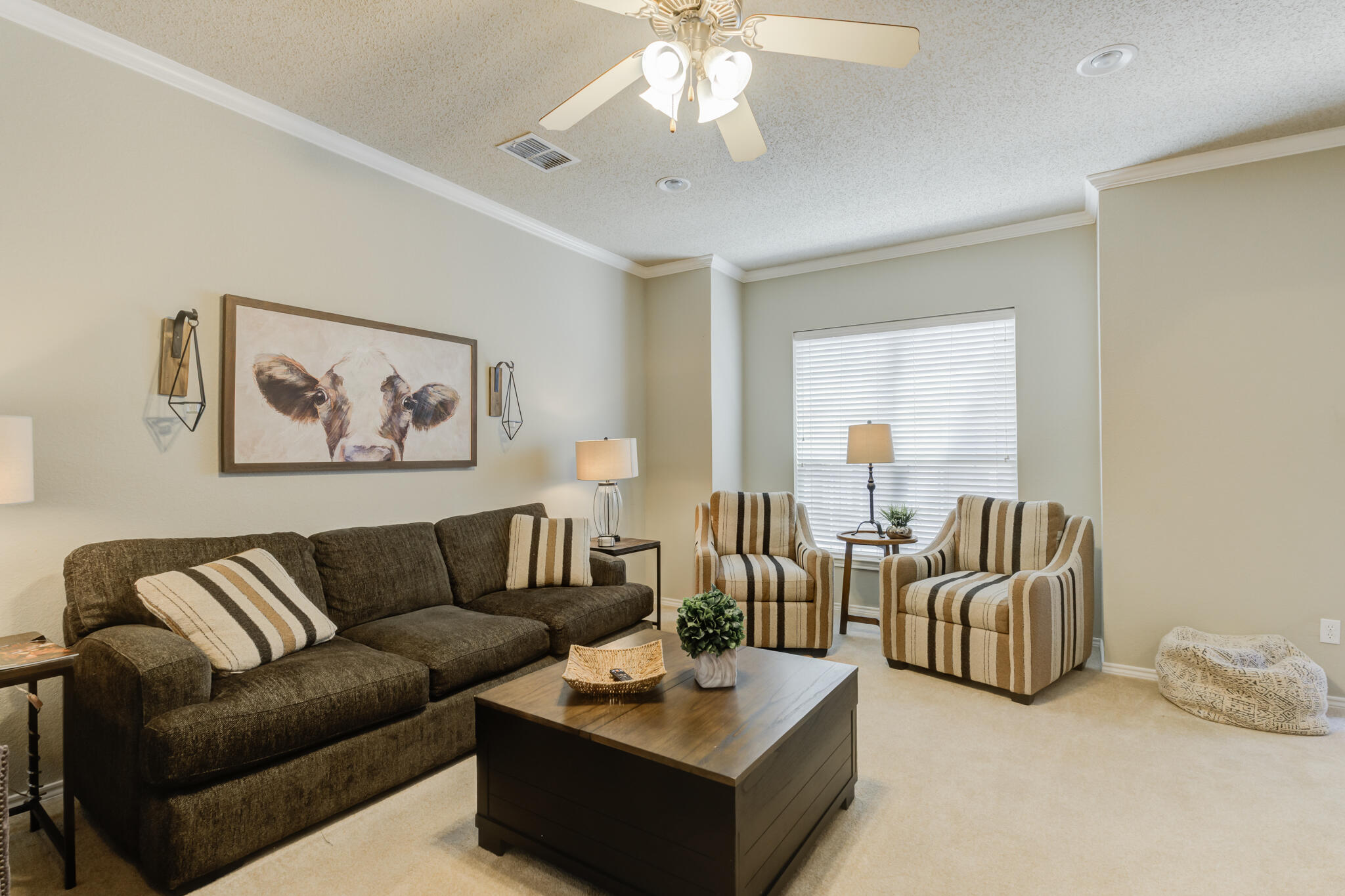 2111 Main Street, Unit 3 Lubbock, TX 79401 - Photo 23 of 49 a living room with furniture and a large window