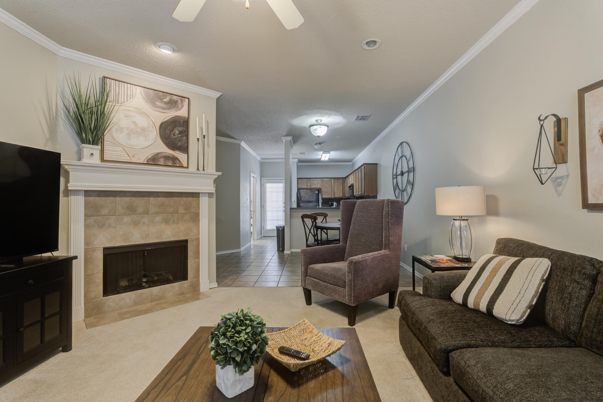 2111 Main Street, Unit 3 Lubbock, TX 79401 - Photo 25 of 49 a living room with furniture and a fireplace